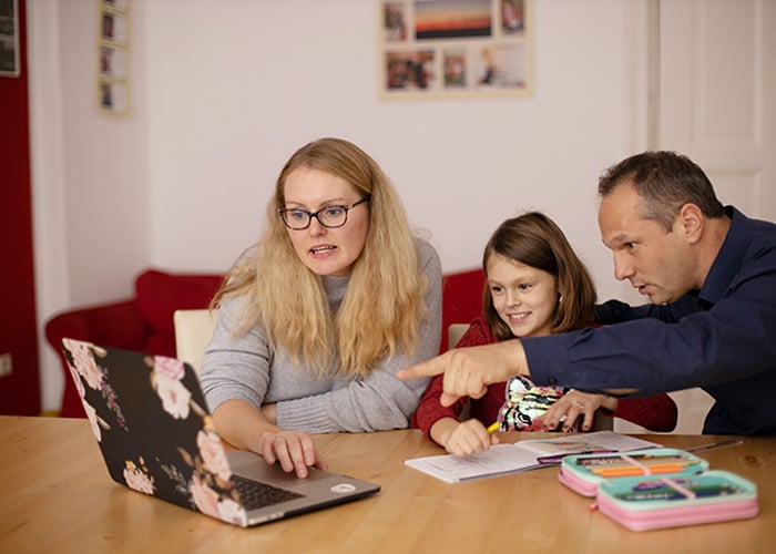 family-on-computer-at-home-during-lockdown