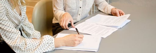 American admissions officers looking through university applications.